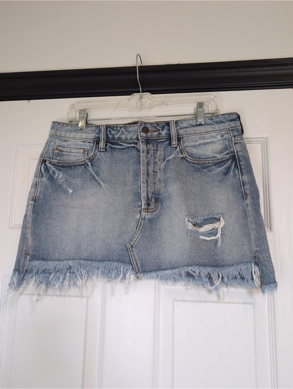 Large Women's Hidden distressed denim mini skirt with frayed hem